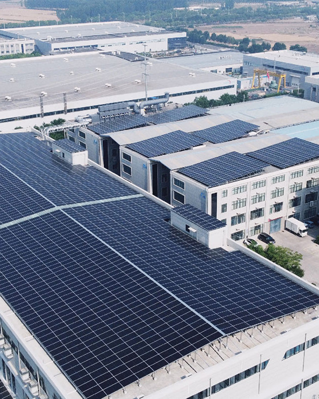 Solar-powered manufacturing facility reducing carbon footprint in the production of sustainable insole materials and eco-friendly components.